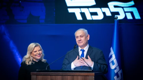Israeli Prime Minister Benjamin Netanyahu and his wife, Sara, address supporters on the night of the Israeli elections at Likud Party headquarters in Tel Aviv, March 2, 2020. Photo by Olivier Fitoussi/Flash90.