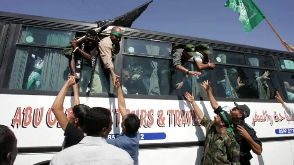Palestinians who were freed from Israeli jails, as part of a prisoner-exchange deal to have for Israel Defense Forces kidnapped soldier Gilad Shalit returned home, arrive at the Rafah crossing border in the Gaza Strip, Oct. 18, 2011. Photo by Abed Rahim Khatib/Flash 90.