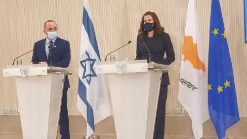 Israeli Energy Minister Yuval Steinitz and Cypriot Energy Minister Natasa Pilides at the signing of a Memorandum of Understanding (MoU) in Nicosia, Cyprus, regarding the construction of an undersea power cable connecting the two countries' power grids, as well as that of Greece, March 8, 2021. Source: Twitter.