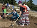 Women and children from Jewish settler families work on a plot to plant flowers and vegetables for a community garden project in the West Bank Jewish settlement of Bat Ayin in Gush Etzion, near Jerusalem, on May 21, 2013. Photo by Gershon Elinson/Flash90.