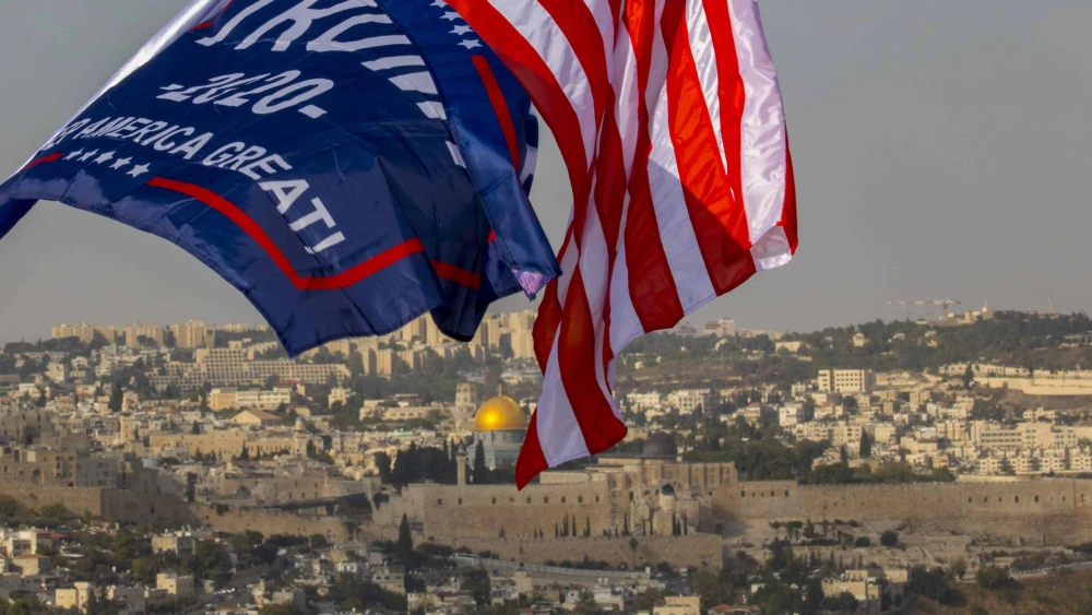 Israeli supporters of Donald Trump wave flags in Jerusalem to support his candidacy for the presidential election, Oct. 27, 2020. Photo by Olivier Fitoussi/Flash90.