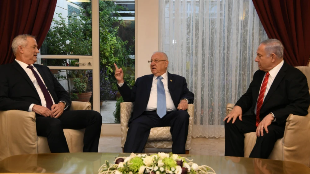 Israel's President Reuven Rivlin meets with Israeli Prime Minister Benjamin Netanyahu, and Blue and White Party leader Benny Gantz, at the President Residence in Jerusalem on Sept. 25, 2019. Photo by Amos Ben Gershom/GPO.