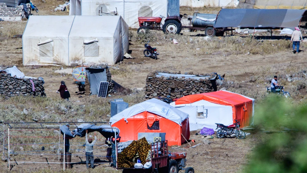View of a tent camp of Syrian refugees near the Syrian village of Burayqah as it seen from the Israeli side of the border on July 1, 2018. Photo by Basel Awidat/Flash90.