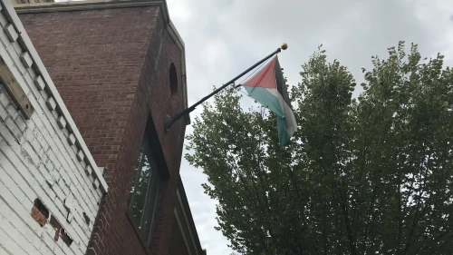The Palestinian flag moments before being taken down from the PLO Mission in Washington in advance of its being ordered closed by the Trump administration, Oct. 10, 2018. Credit: Jackson Richman/JNS.