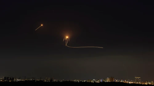 A long-exposure picture showing Israel's Iron Dome air-defense system intercepting rockets fired from the Gaza Strip, as seen from Ashkelon, May 14, 2021. Photo by Avi Roccah/Flash90.