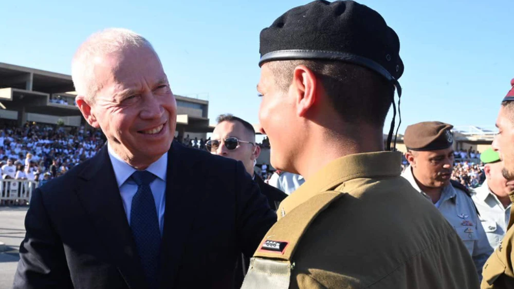 Defense Minister Yoav Gallant congratulates cadet graduates at the Bahad 1 officers training base near Mitzpe Ramon in the Negev, June 28, 2023. Source: Twitter.
