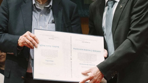 Hebrew University professor Martin Adelman and president Asher Cohen