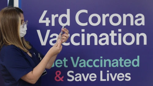 A health worker prepares a fourth dose of Pfizer COVID-19 vaccine at the Sheba Medical Center. on Dec. 31, 2021. Photo by Tomer Neuberg/Flash90.