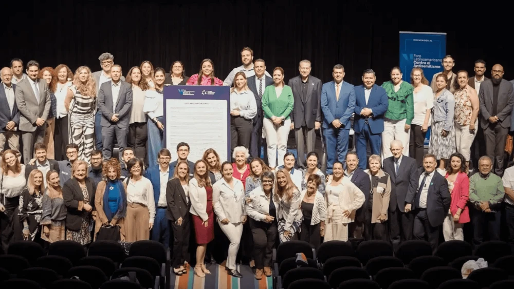 Participants in CAM's fifth-annual Latin American Forum Against Antisemitism, held in Rio de Janeiro, Brazil, stand with the forum's joint declaration, Oct. 13, 2025. Credit: Courtesy.
