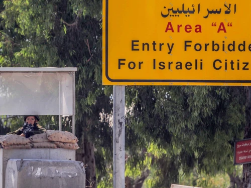 Israeli soldiers guard the entrance to the western Samaria city of Qalqilya, following a suspect shooting attack, June 22, 2024. Photo by Nasser Ishtayeh/Flash90.