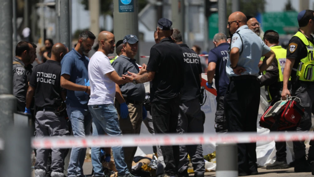 Israeli Police at the scene of a stabbing attack near Ammunition Hill in Jerusalem, where two young men were injured and the assailant was neutralized by officers on the scene, May 24, 2021. Photo by Yonatan Sindel/Flash90.