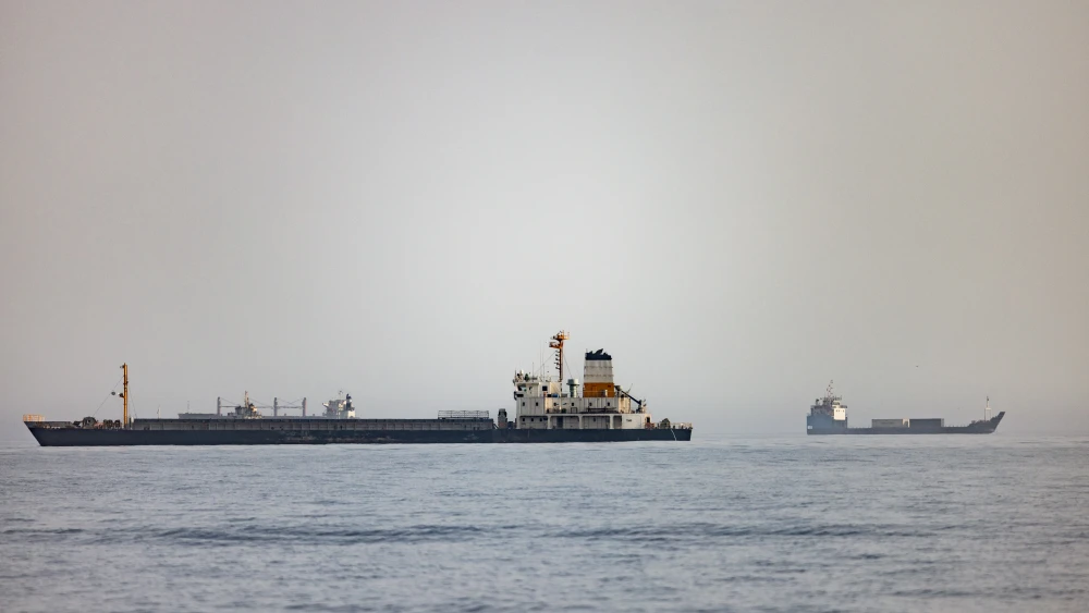 Cargo vessels remain anchored off Port Sultan Qaboos on June 20, 2026, in Muscat, Oman. Photo by Getty Images.