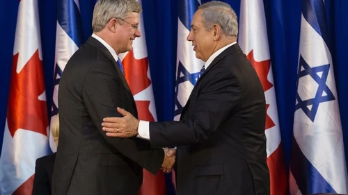 Israeli Prime Minister Benjamin Netanyahu shakes hands with Canadian Prime Minister Stephen Harper during a welcoming ceremony for Harper at Netanyahu's office in Jerusalem on Jan.19, 2014. Photo by Flash90.