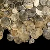 A hoard of coins from the Mamluk period discovered off the coast of Caesarea in 2021. Credit; Israel Antiquities Authority.