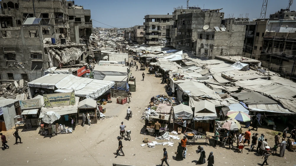 Palestinians are seen in Khan Younis, southern Gaza Strip, on Aug. 12, 2026. Photo by Abed Rahim Khatib/Flash90.