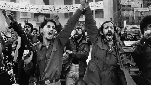 Terrorists outside the U.S. embassy in Tehran, where diplomats were being held hostage, 1979. Photo by Abbas Attar via Wikimedia Commons.