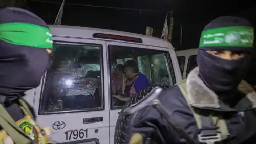 Members of Hamas and the Islamic Jihad release Israeli hostages to the Red Cross in Rafah in the southern Gaza Strip, Nov. 28, 2023. Photo by Flash90.