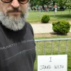 Luke Moon protesting a pro-Palestinian rally.