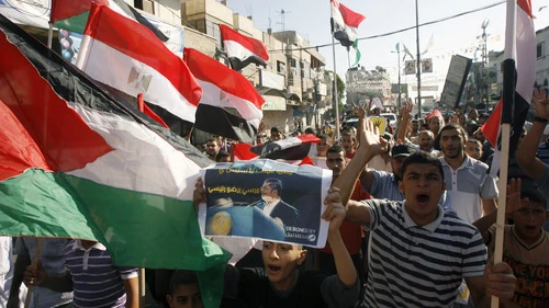 Palestinians gather during a demonstration in support of ousted Egyptian President Mohamed Morsi in the Hamas-controlled southern Gaza Strip town of Rafah on August 23, 2013. The removal of Morsi—a president from Hamas's parent group, the Muslim Brotherhood—creates "serious problems for Hamas," Matthew Levitt of the Washington Institute for Near East Policy said. Credit: Abed Rahim Khatib/Flash 90.