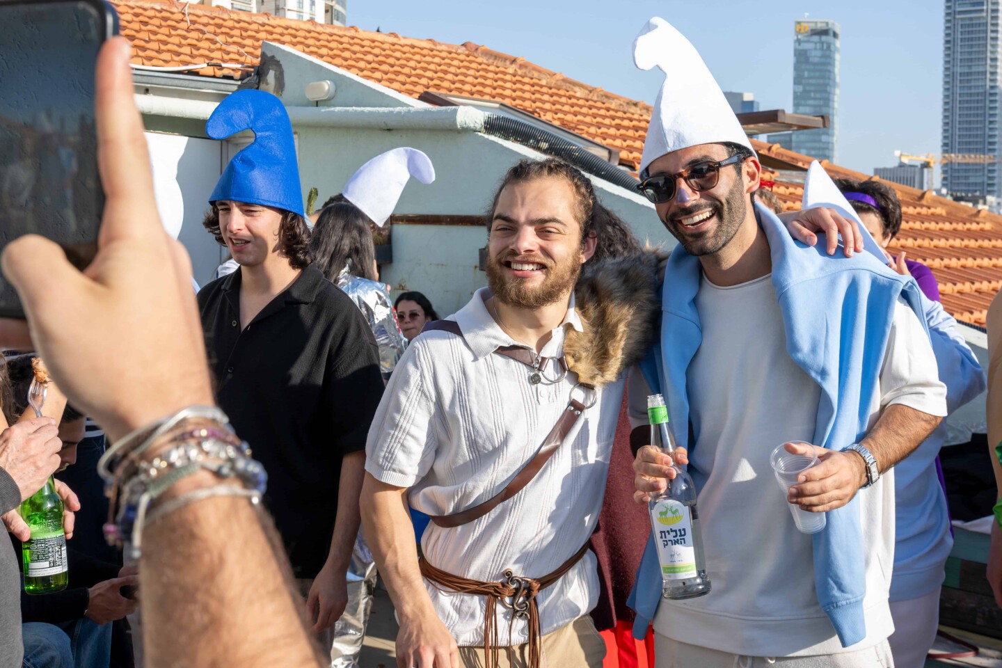 People dressed in costume pose for photos