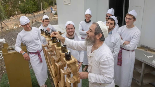 Jewish priests (Kohanim) practice in rituals on an altar built to the original dimensions of the Temple altar according to Jewish tradition, at the Letchila Haredi Farm near Ma’ale Adumim, in Judea and Samaria, Dec. 21, 2025. Photo by Chaim Goldberg/Flash90.