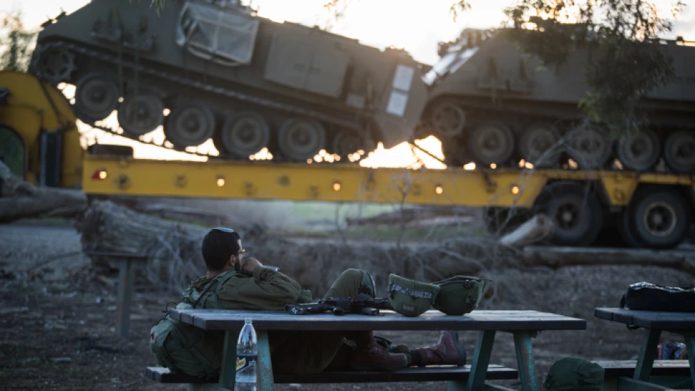 Israeli soldiers rest close to kibbutz Nir Oz in southern Israel, near the border with Gaza, on Nov. 12, 2018. Photo by Hadas Parush/Flash90.
