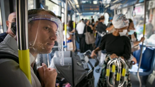 Passengers aboard the Jerusalem light rail on April 21, 2020. Photo by Olivier Fitoussi/Flash90.