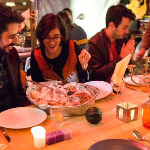 Israelis and Americans enjoy a Thanksgiving dinner together in Tel Aviv on Nov. 29, 2014. Photo by Danielle Shitrit/Flash90.