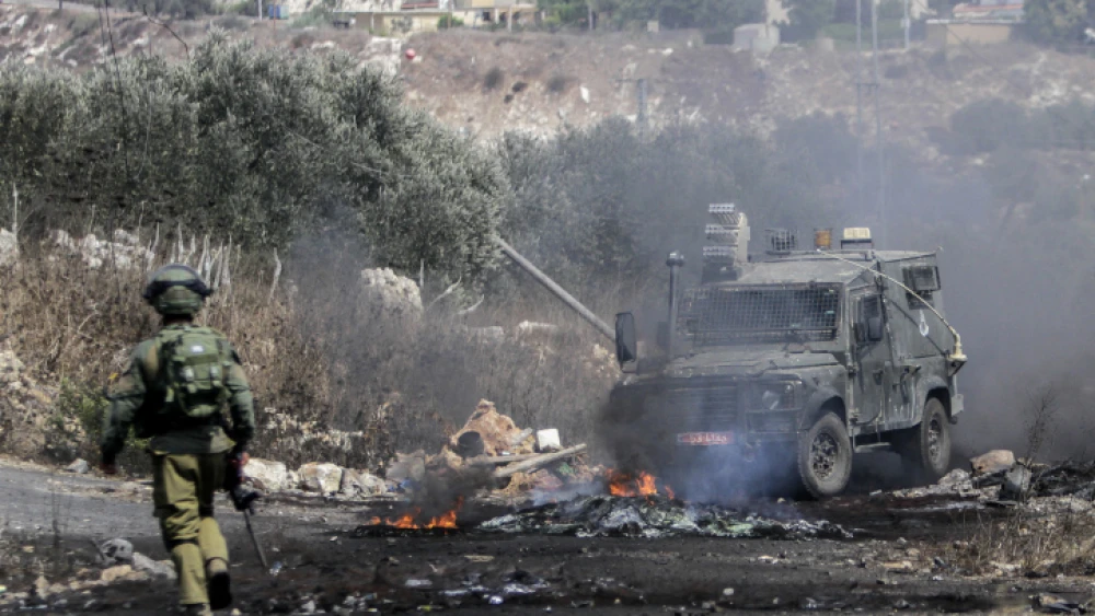 Palestinian demonstrators clash with Israeli security forces during a protest in the village of Kfar Qaddum, near Nablus/Shechem, on Sept. 11, 2020. Photo by Nasser Ishtayeh/Flash90.