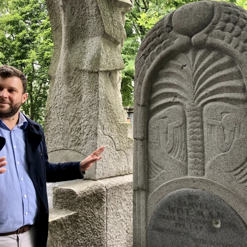 Michał Laszczkowski, CEO of Poland’s Cultural Heritage Foundation, gives a tour of the Jewish cemetery in Warsaw, July 2019. Photo by Eliana Rudee.