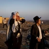 Ultra-Orthodox, or haredi, Jewish men at the Derech Emunah outpost in Judea and Samaria, on Aug.16, 2022. Photo by Yonatan Sindel/Flash90.