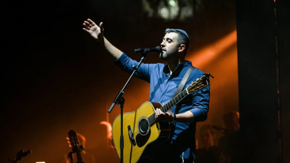 Israeli singer Ishay Ribo performs live at Sultan's Pool in Jerusalem, on Sept. 21, 2022. Photo by Arie Leib Abrams/Flash90.
