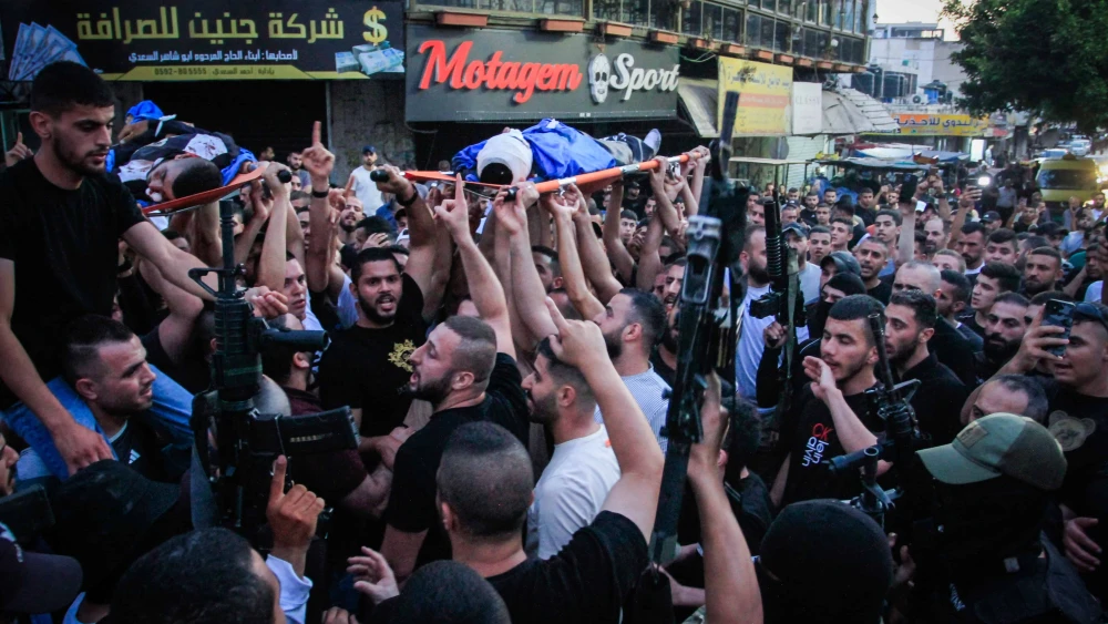 Armed Palestinians attend a funeral of terrorists killed during an Israeli military operation in the city of Jenin, June 6, 2024. Photo by Nasser Ishtayeh/Flash90.