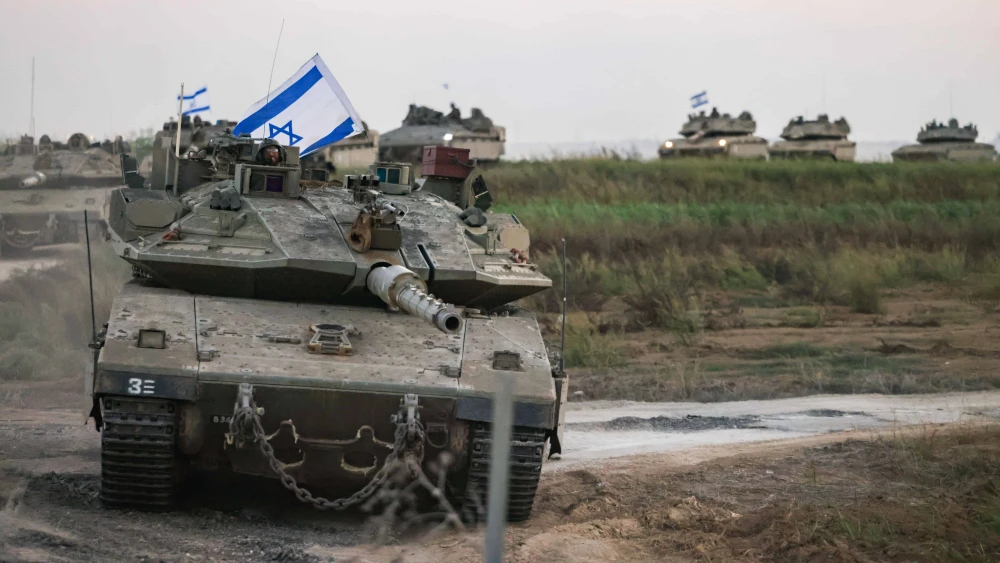 A convoy of Israel Defense Force tanks heads to the southern Israeli border with Gaza on Oct. 12, 2023. Photo by Chaim Goldberg/Flash90.