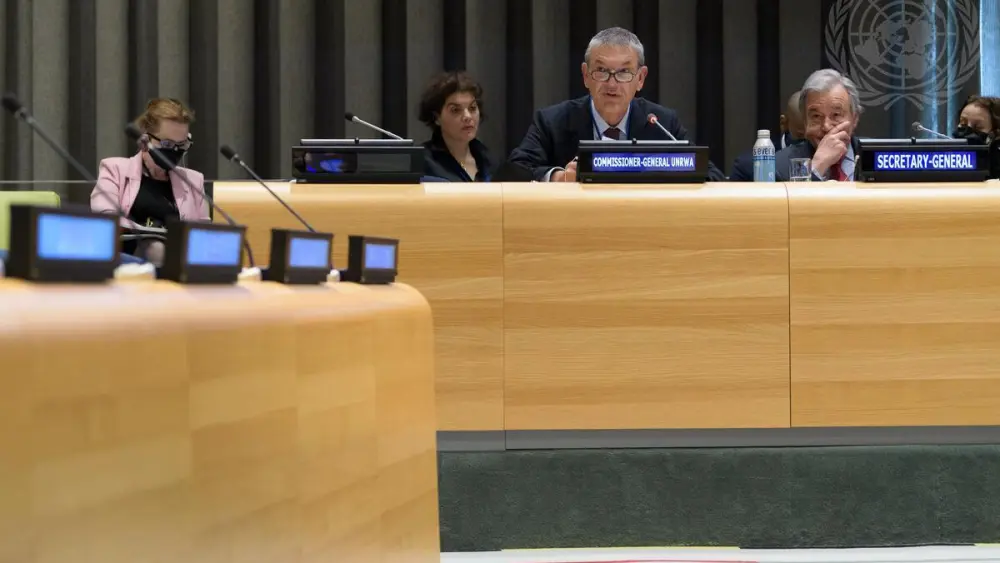 UNRWA Commissioner-General Philippe Lazzarini (second from right) addresses the pledging conference of the Ad Hoc Committee of the General Assembly for the announcement of voluntary contributions to UNRWA. At right is U.N. Secretary-General António Guterres. Credit: United Nations.