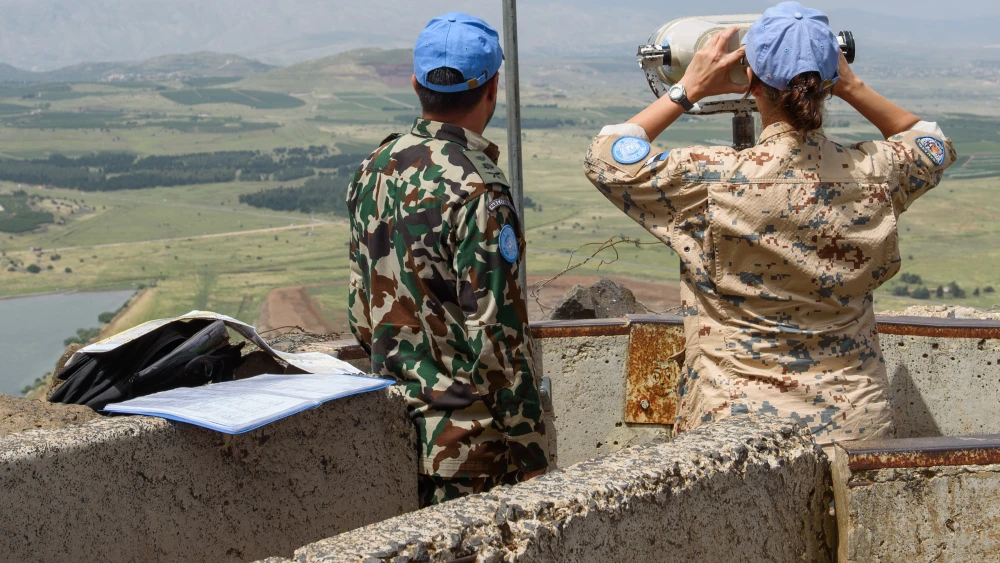 U.N. observers posted on Mount Bental overlooking the border with Syria in the Golan Heights in northern Israel on May 10, 2018. Photo by Basel Awidat/Flash90.