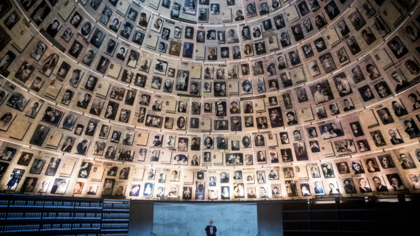 A security guard stands in the empty Hall of Names at the Yad Vashem Holocaust Memorial Museum in Jerusalem on April 19, 2020. Photo by Yonatan Sindel/Flash90.