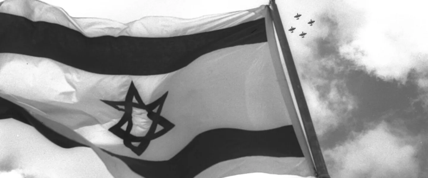 Israeli fighter jets fly over the nation's flag on Independence Day celebrations in 1957. Photo by Moshe Pridan/Government Press Office.