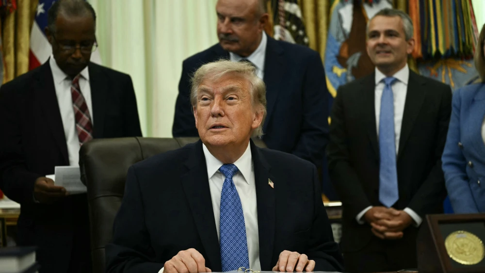 U.S. President Donald Trump takes questions after presenting findings of his Religious Liberty Commission in the Oval Office of the White House in Washington, D.C., on June 26, 2026. Photo by Kent Nishimura/AFP via Getty Images.