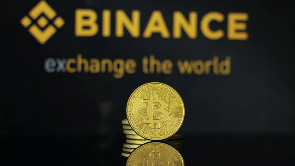 Close-up of a cryptocurrency coin with the Binance logo in the background. Credit: Bastian Riccardi/Pexels.
