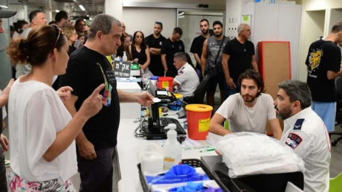 Hundreds in line at Tel Aviv Sourasky Medical Center (Ichilov Hospital) to donate blood for those wounded by a barrage of rockets fired by the Hamas terrorist group into Israel on Oct. 7, 2023. Photo by Tomer Neuberg/Flash90.