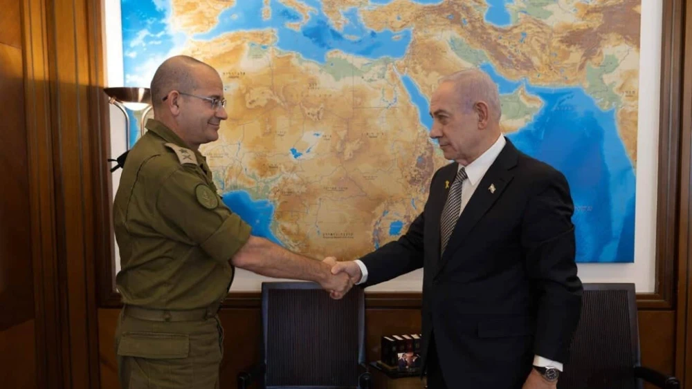 Israeli Prime Minister Benjamin Netanyahu greets Maj. Gen. Roman Gofman upon his appointment as the next head of the Mossad intelligence agency, in Jerusalem, Dec. 4, 2025. Credit: Prime Minister's Spokesperson's Office.