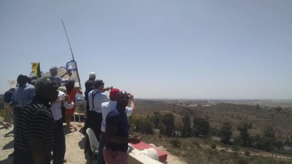 Click photo to download. Caption: During a solidarity mission arranged by Christians United for Israel, Evangelical pastors view Gaza from a hilltop in the southern Israeli city of Sderot. Credit: Sean Savage.