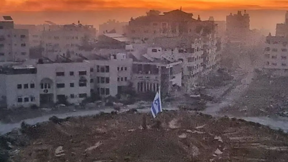 The Israeli flag raised in Gaza City's "Palestine Square." Source: Screenshot.