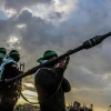 Members of Hamas’s Al-Qassam Brigades waiting for the handover of the bodies of four Israeli hostages to the Red Cross in Khan Yunis, the southern Gaza Strip, on Feb. 20, 2025. Photo by Abed Rahim Khatib/Flash90.