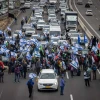 Protesters block Route 1 between Tel Aviv and Jerusalem over the Israeli government's judicial reforms, Feb. 9, 2023. Photo by Yonatan Sindel/Flash90.