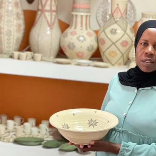 Artist Zenab Grabia with one of her many unique artworks at her gallery in the Bedouin town of Segev Shalom in the Negev Desert. Photo courtesy of Zenab Grabia.