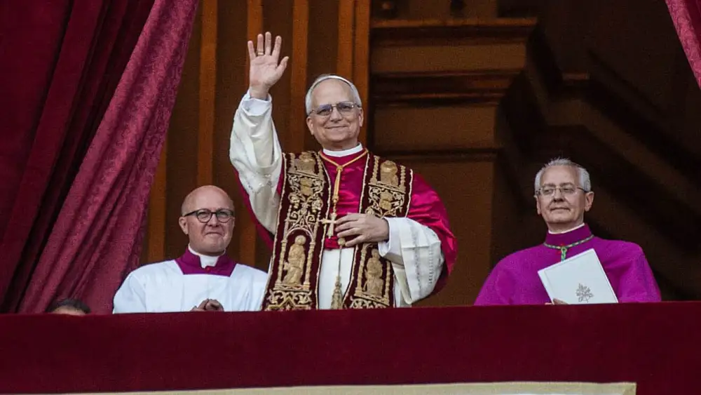 Pope Leo XIV greets the crowd from St. Peter's Basilica in Vatican City after being elected by the Conclave of Cardinals on May 8, 2025. Photo by Ivan Romano/Getty Images.