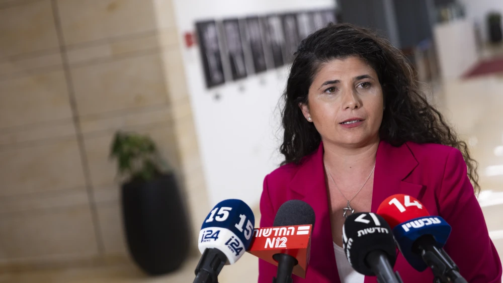 Knesset member Sharren Haskel, speaking in Jerusalem, announces her resignation as deputy foreign minister, July 14, 2026. Photo by Chaim Goldberg/Flash90.