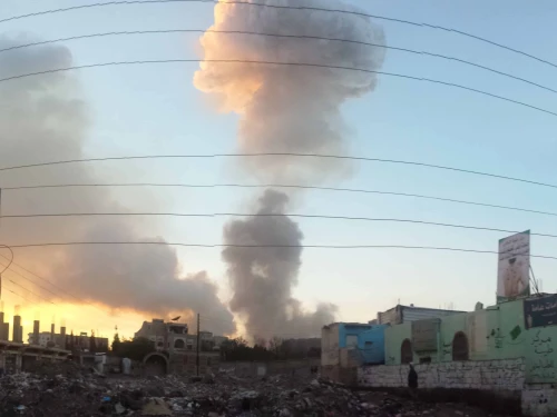 Smoke billows from the site of an airstrike in Sanaa, Yemen. Photo by Ibrahem Qasima via Wikimedia Commons.